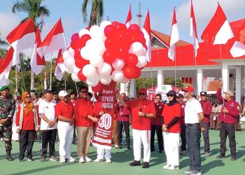 Ribuan Bendera Merah Putih Dibagikan, Kukar Sambut Bulan Kemerdekaan