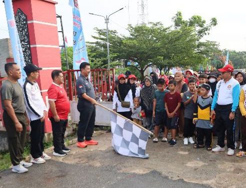 Jalan Sehat di Muara Badak Ajak Warga Kukar Hidup Aktif dan Bersosialisasi